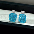 “Macaron” sterling silver simulated blue topaz studs