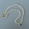 Small pearl beaded navy eye necklace