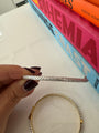 Silver baguette stone pave bangle