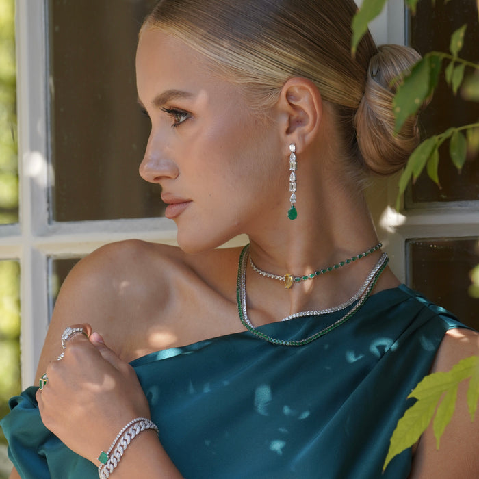 Sterling silver pear shaped drop emerald earrings