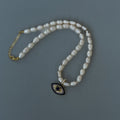 Pearl beaded “Eyeland” eye necklace