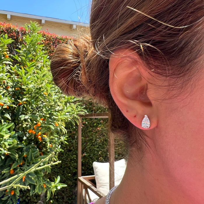 Sterling silver pear 7 mm moissanite stud earrings