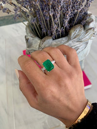 Sterling silver Emerald green ring with baguette side stones