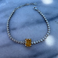 Yellow emerald cut sterling silver tennis bracelet