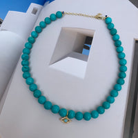 Turquoise beaded gold eye necklace