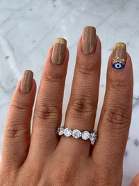 Sterling silver 5 mm round cut eternity band