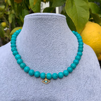Turquoise beaded gold eye necklace