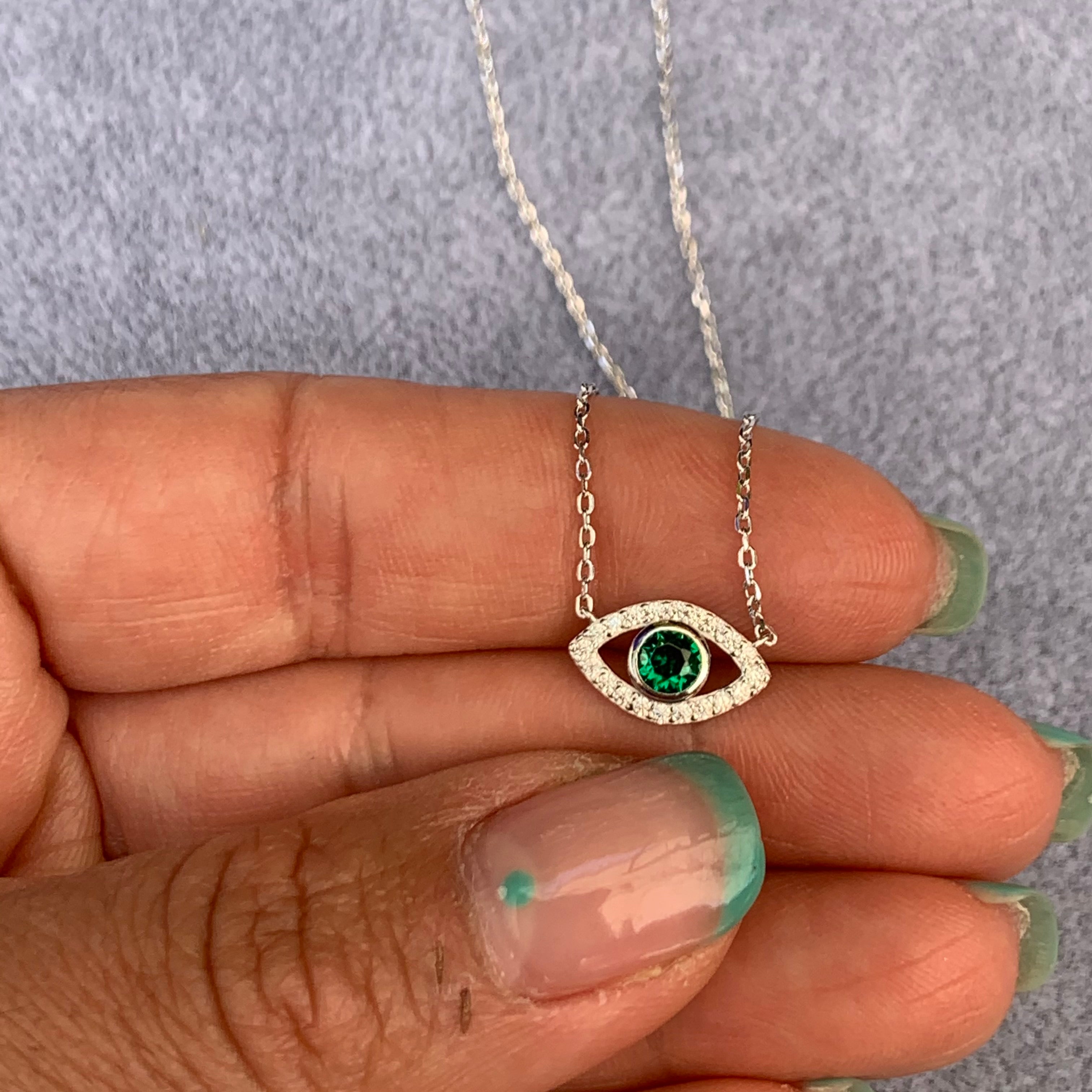 “Ojos” Sterling silver green eye necklace