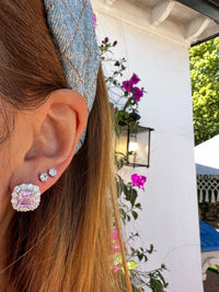 Sterling silver simulated pink sapphire halo studs