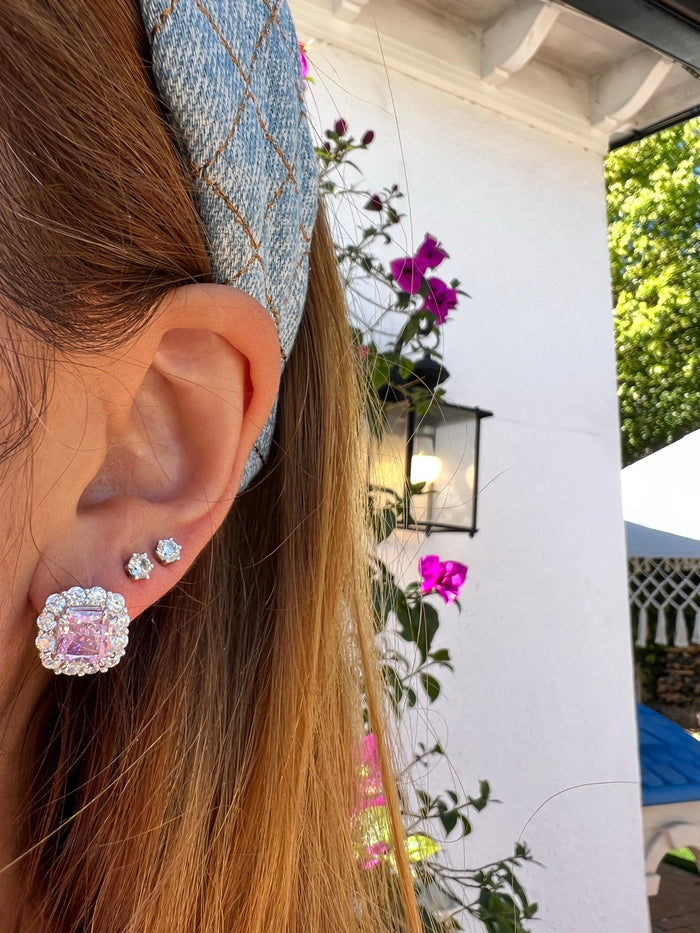 Sterling silver simulated pink sapphire halo studs