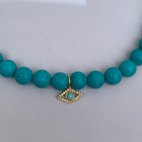 Turquoise beaded gold eye necklace