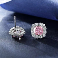 Sterling silver simulated pink sapphire halo studs