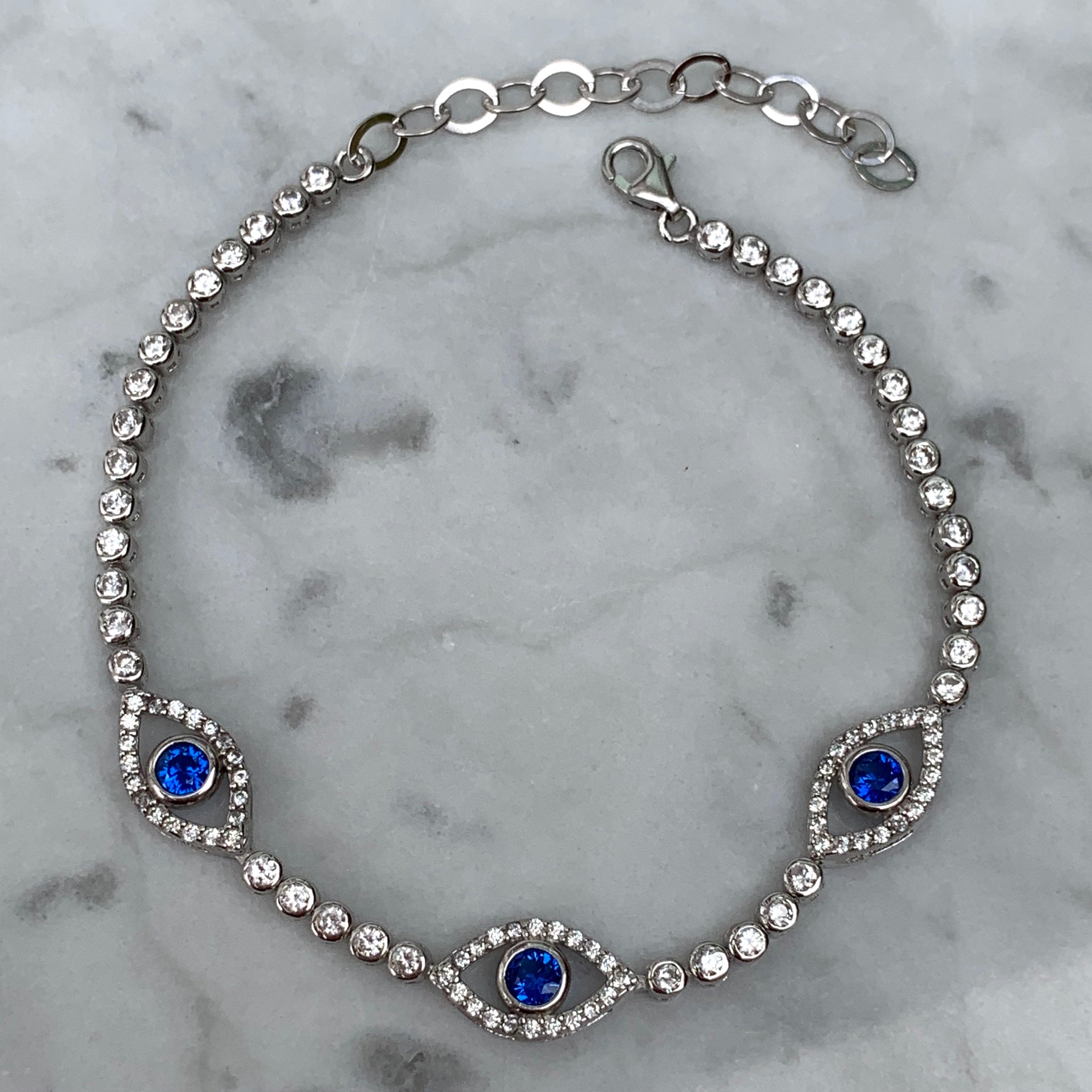 Sterling silver classic navy blue tennis eye bracelet