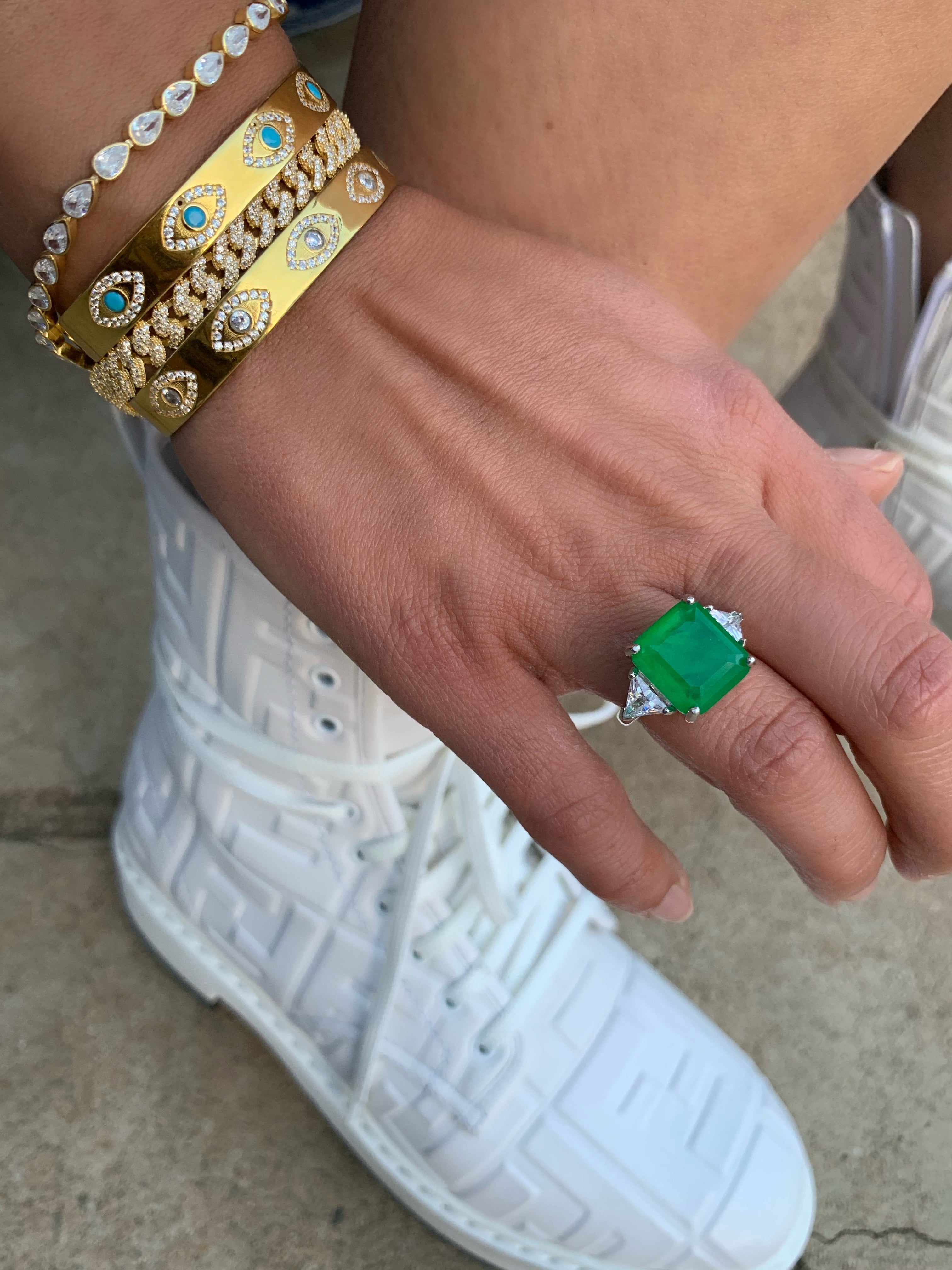 Sterling silver Emerald green ring with triangle cut side stones