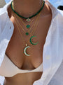 “Mezzaluna” gold green pave crescent necklace