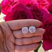 Sterling silver simulated pink sapphire halo studs