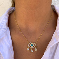 Gold plated turquoise “Diamond Tears" eye necklace