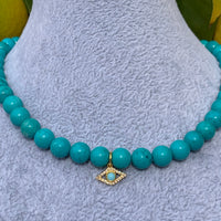 Turquoise beaded gold eye necklace