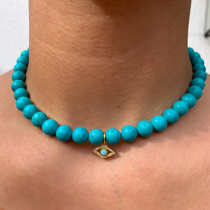 Turquoise beaded gold eye necklace