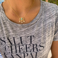 Gold plated turquoise “Diamond Tears" eye necklace